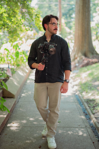 Louisville wedding videographer Reventure Media behind the scenes, smiling and relaxed