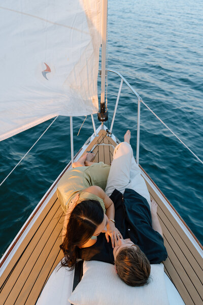couple cuddling on a boad