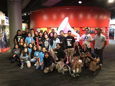 Group of youth with founder, Joe Kaprielan