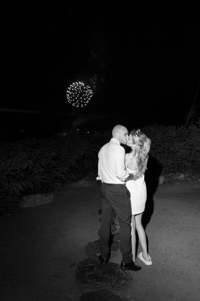 A bride and her bridesmaids smile and laugh with one another at John Joseph Inn before the bride gets married. 