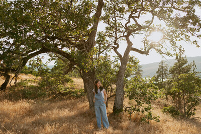 girl standing on road bridge in columbia river gorge