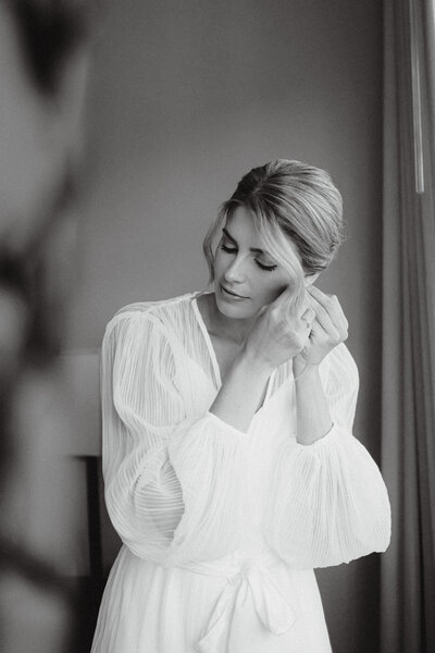Bride getting ready portrait in wedding robe - Makeup and hair updo by Yana Beauty studio based in California bay area, California. 