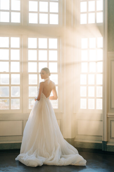 Virginia Wedding Photographer, bride and groom leaning against a light post