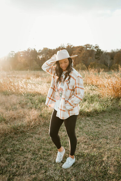 Photographer Tonya Cassibry in one of her favorite Charlotte locations, a perfect sunlit spot for family or maternity photos.