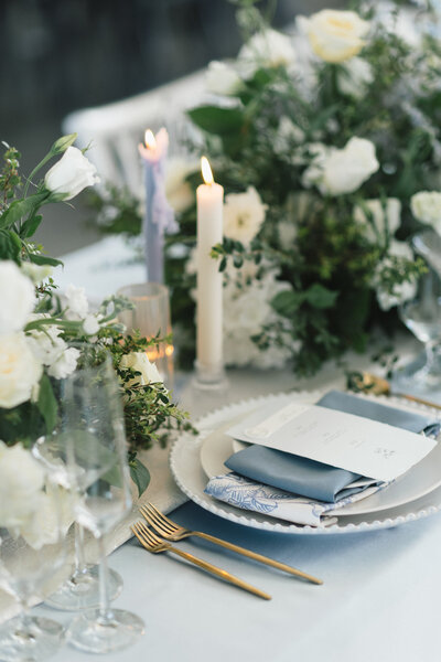 Styled shoot at Farmhouse on Green Bluff in Spokane WA.  Table with lit candles and elegantly set table