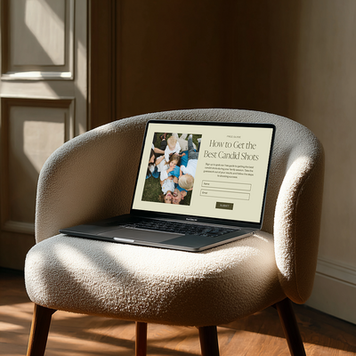showit website design featured on laptop sitting on boucle chair with sun shining in