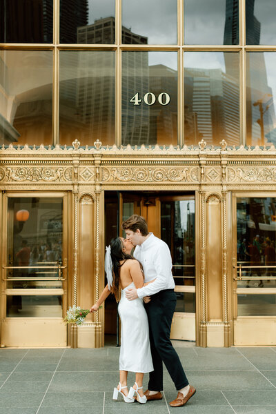 Bride and groom walk up memorial steps at their DC wedding