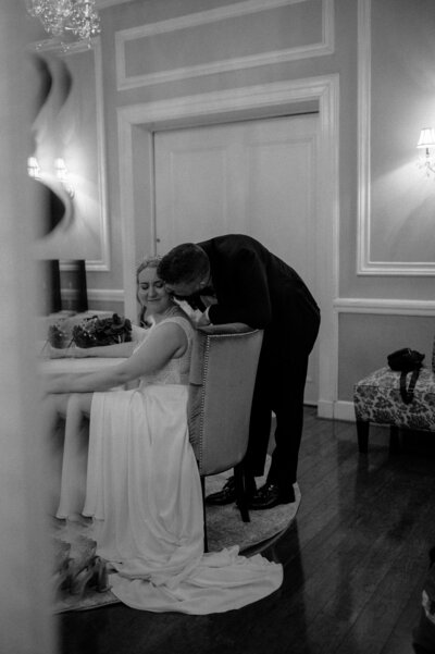 wedding elopement in baltimore maryland at the belvedere wedding venue with photography upstairs of bride and groom