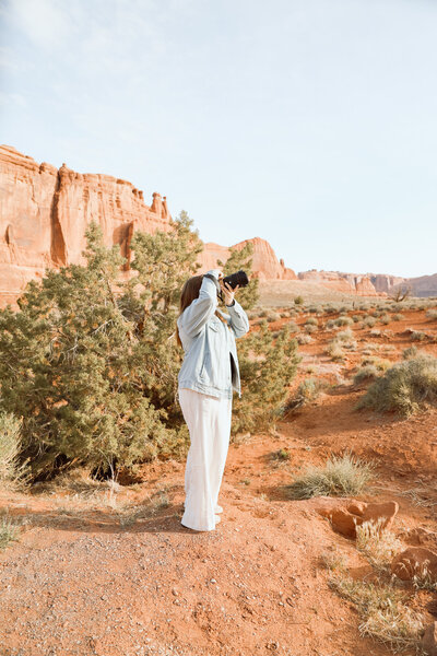 Smiling at Arches National Park during photography session