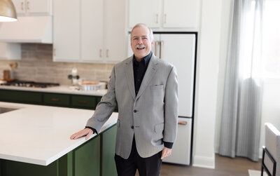 realtor standing in a kitchen
