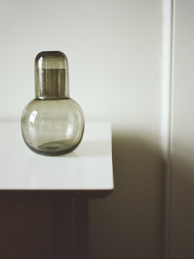 clear green glass hand blown carafe, film brand photography at ALEO Detroit by Christina Harrison