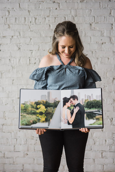 Ashley Biess custom designs her wedding albums for each of her clients