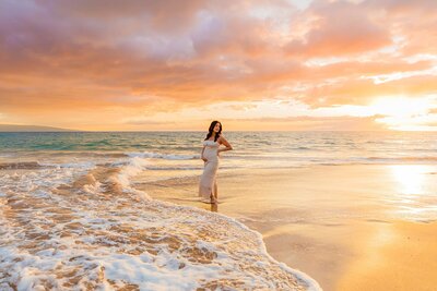 maternity portrait photographed by love and water photography on maui under the full moon