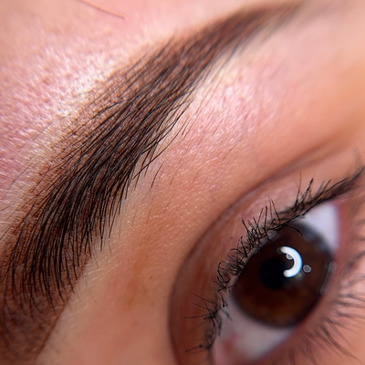 Soft, natural powder brows that frame and complete the face.