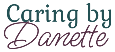 graphic of a logo with a multi color swirl and the name Deb Penner in the center