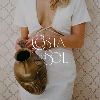 Woman holding vase image with logo on top