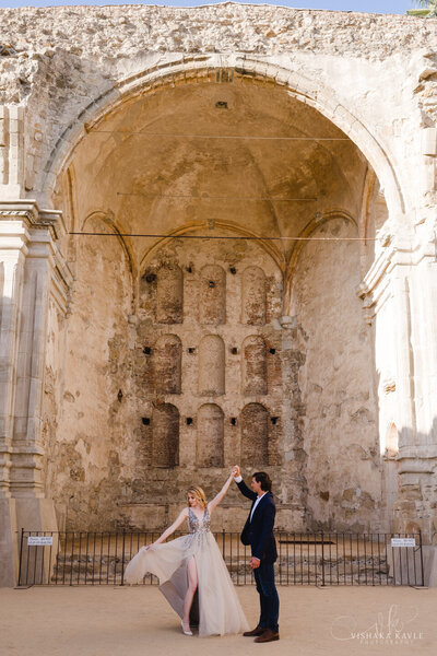 photo of bride and groom dancing taken by Southern California wedding photographer