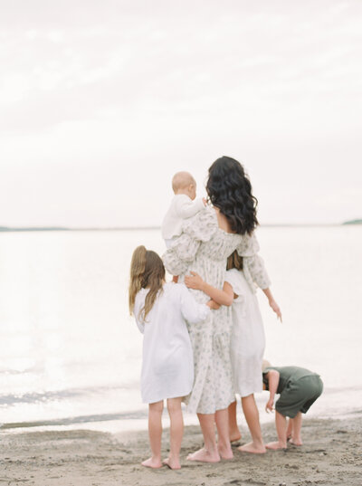 Denver Family Photographer featuring mom with children at the beach.
