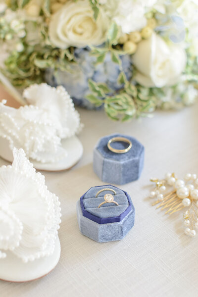 White pearled heels, velvet blue ring box and details from a timeless wedding.  