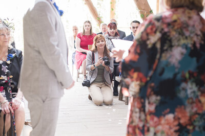 Wedding photographer photographing wedding ceremony
