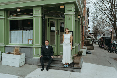 bride and groom outside of frank's before elopement party shot by Elsie Goodman Photography | NYC Elopement Packages