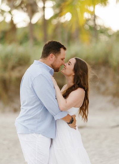 Engaged couple on the beach in Miami, Florida, captured by Claudia Amalia, a wedding and lifestyle photographer based in Miami and Florida Keys, South Florida. Destination weddings available. Portfolio highlight.