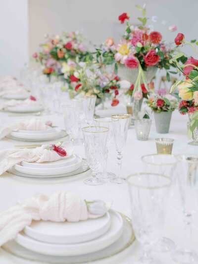 tablescape of bright pink florals