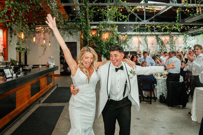 Brides at their wedding reception