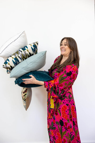 Jess-Harrell-catching-falling-pillows