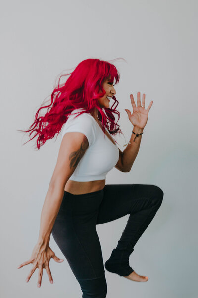 Energetic and Mindful entrepreneur balancing work and wellness with a leap