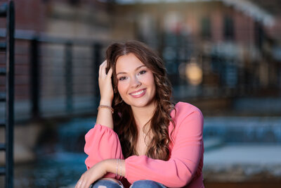 High School Senior in Durham wearing a pink top.