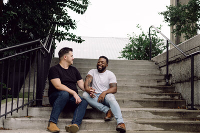 Micah and Dough laughing together during their Richmond engagement shoot.