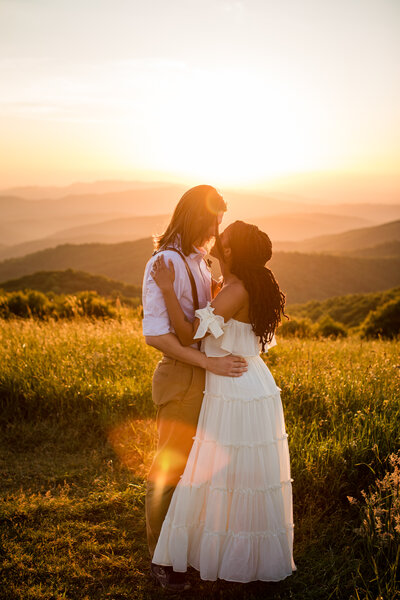 couple hugging during mountain sunset