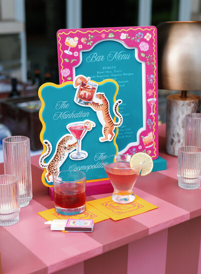 Colorful, watercolor bar menu made of wood, acrylic, and paper