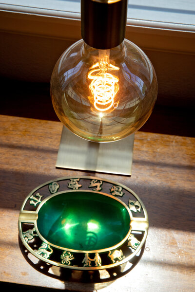 astrological ashtray with edison lightbulb Natalie Beck Photogrpahy