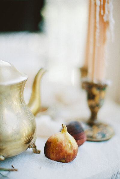 Ripe figs on a breakfast table for a peaceful wedding morning styled by Willow and Oak