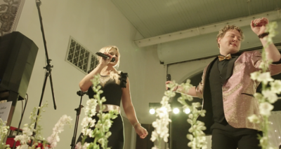 Amy singing at an event