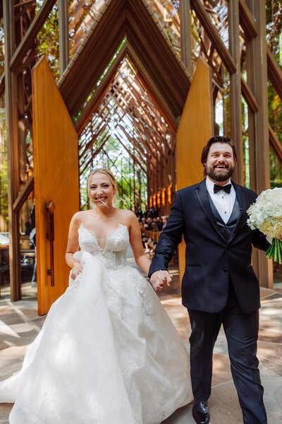 Walking down the aisle with the love of my life at Anthony Chapel in Hot Springs. Taken by Elijah Saldana Phtoography.
