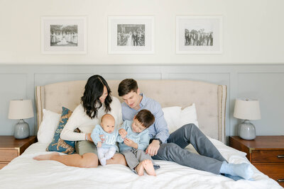 philly couple holds newborn baby in their row home during a newborn session