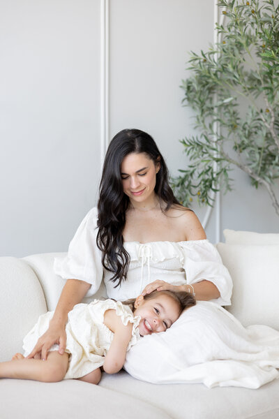 daughter and mom in natural light studio