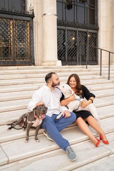Couple sitting on DIA stairs