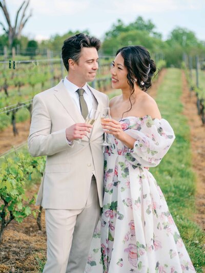 bride and groom toasting at their  morais vineyards wedding