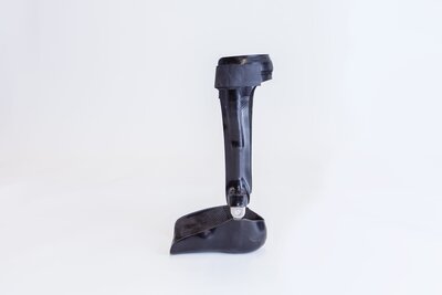 Close-up image of a carbon fiber ankle-foot orthosis, providing lightweight and durable support for ankle and foot stabilization