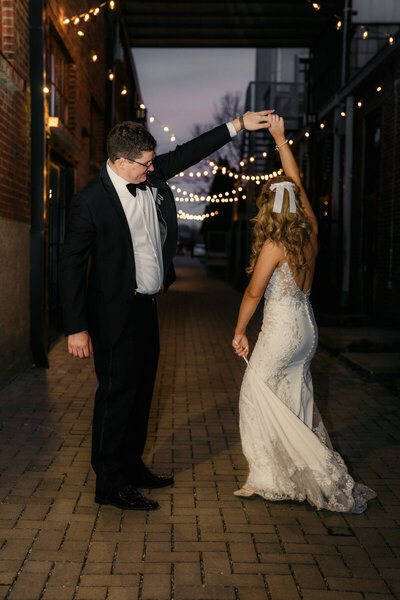 Nashville wedding photographer and videographer captures couple dancing downtown
