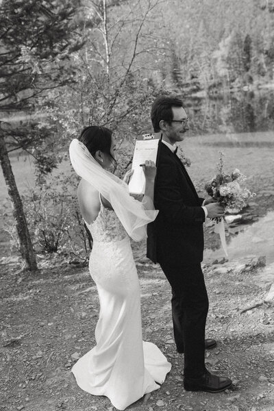 real wedding in edmonton alberta, bride reading note from groom