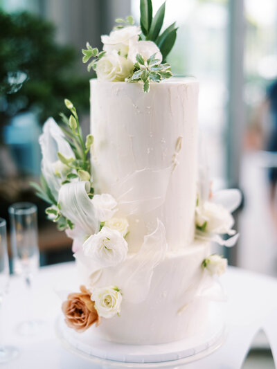 a wedding ring in a vintage case with a paper full of calligraphy by colorado wedding photographer JKG photography