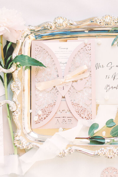 Semi custom wedding invitations in a paper cut jacket