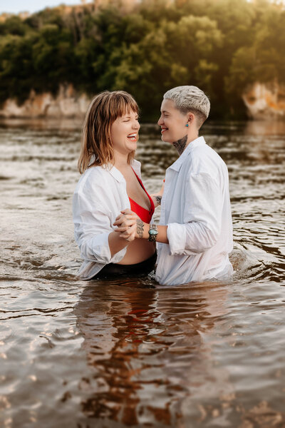 This couple has fun in the Cedar River during their summer session.