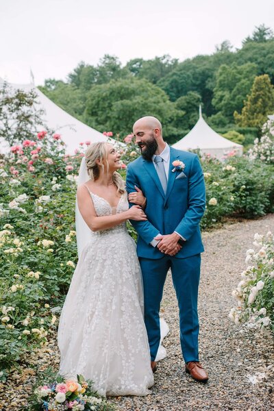 Gardens at Uncanoonuc Mountain - Couple Portrait with Outdoor Tent Venue as Backdrop
