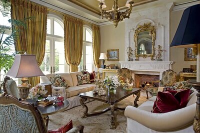Traditional crimson red velvet and gold tapestry sitting room.